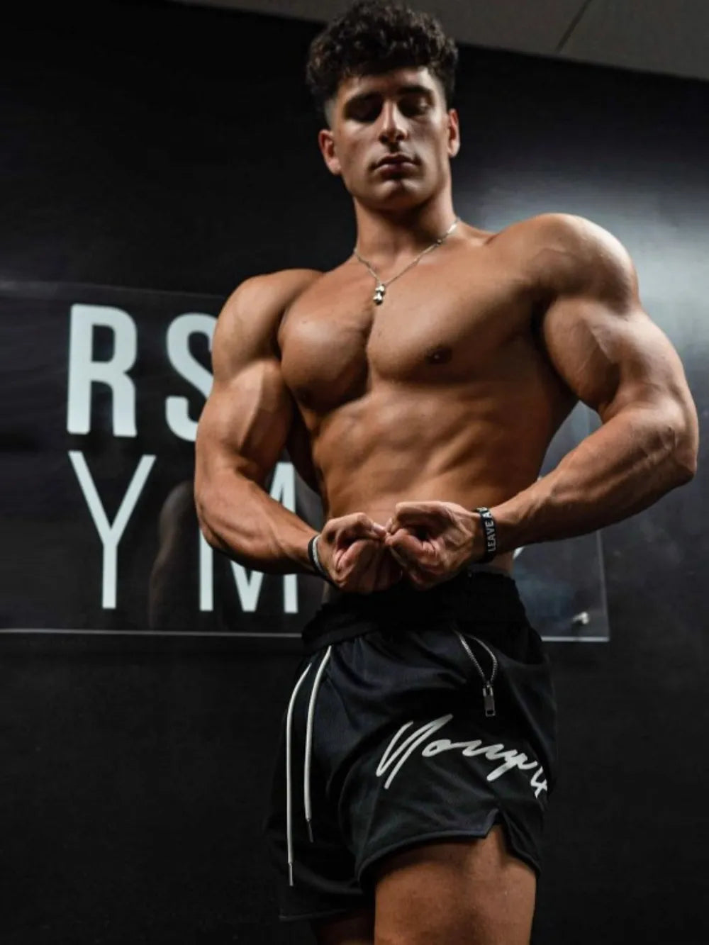 BigFit drawstring jogger shorts in black with white logo and drawstrings.