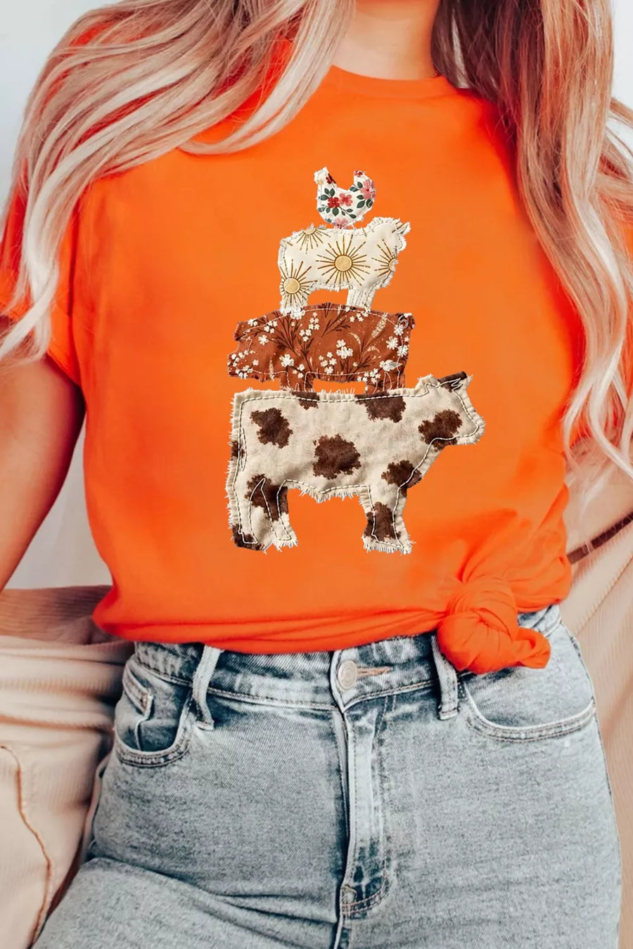 Orange t-shirt with stacked farm animal graphic print, cow, pig, sheep, chicken.