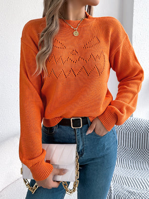 orange pullover sweater with geometric and crew neck