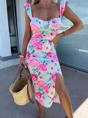 Floral sweetheart midi dress with a thigh slit in pink floral print.