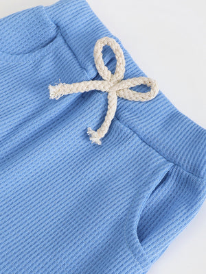 Blue cotton waffle knit pants with drawstring and pockets