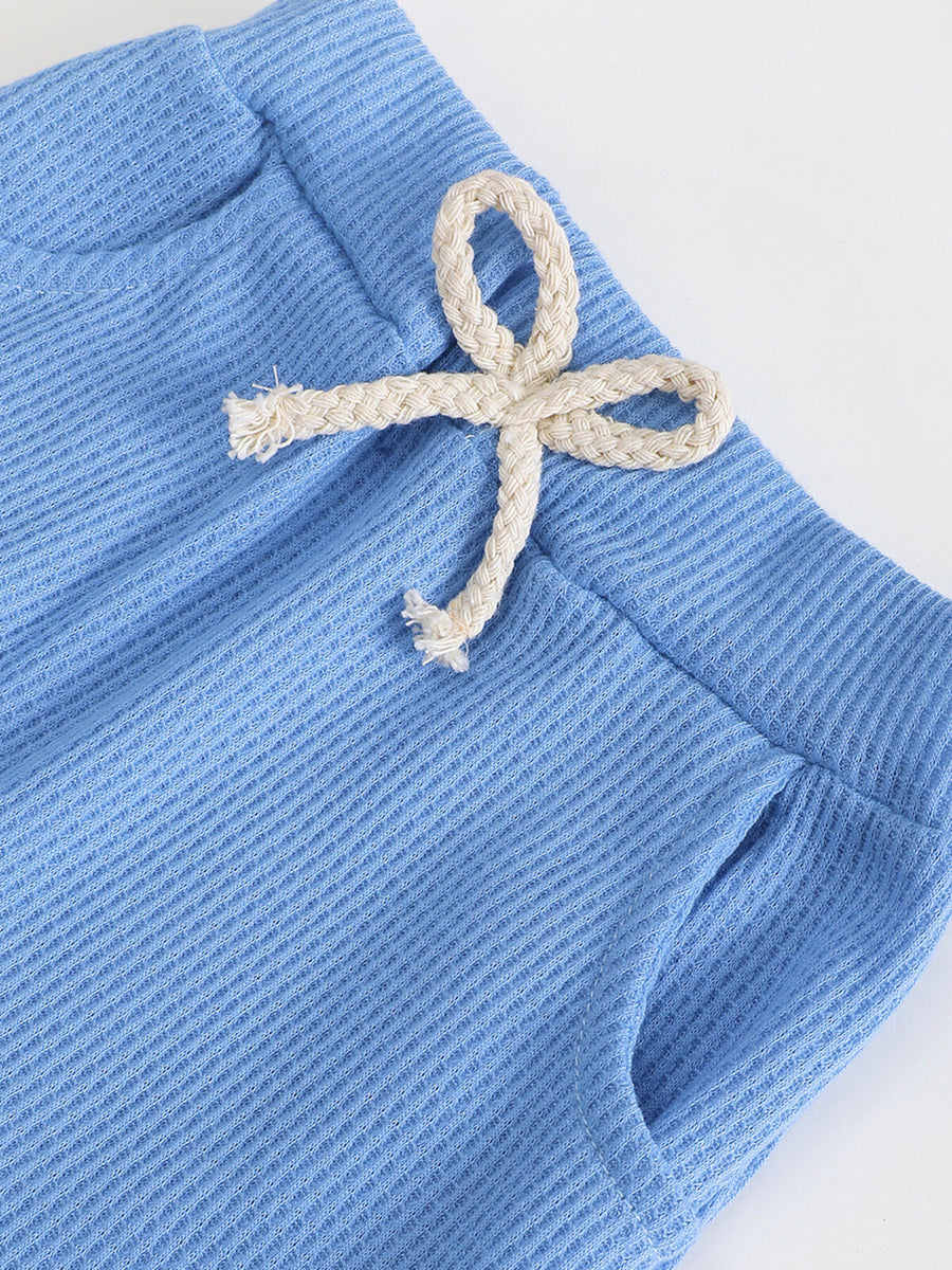 Blue cotton waffle knit pants with drawstring and pockets