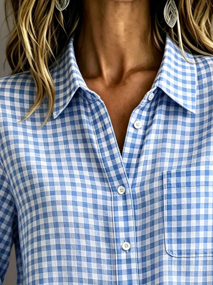 white button-down shirt featuring buttoned and gingham