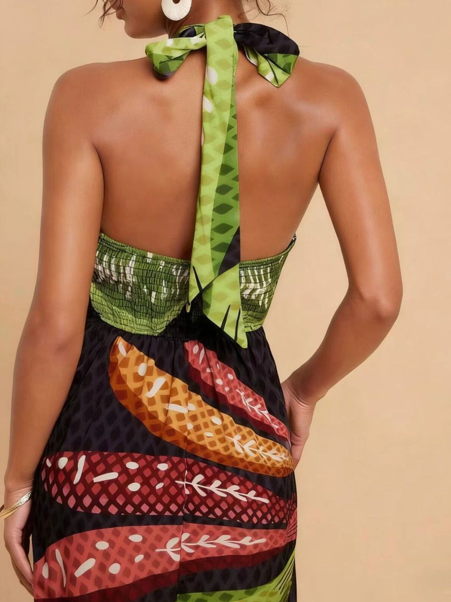 Tropical print halter neck midi dress with smocked bodice and tie back.