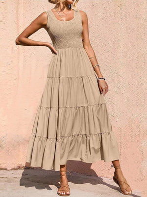Khaki smocked bodice ruffled maxi dress with tiered skirt and scoop neck.