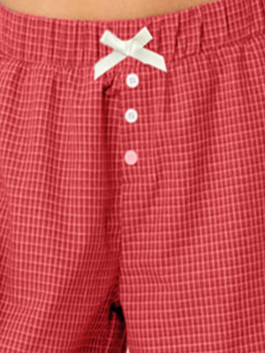 100% polyester Care instructions: Machine wash cold wide-leg pants in red with flared silhouette