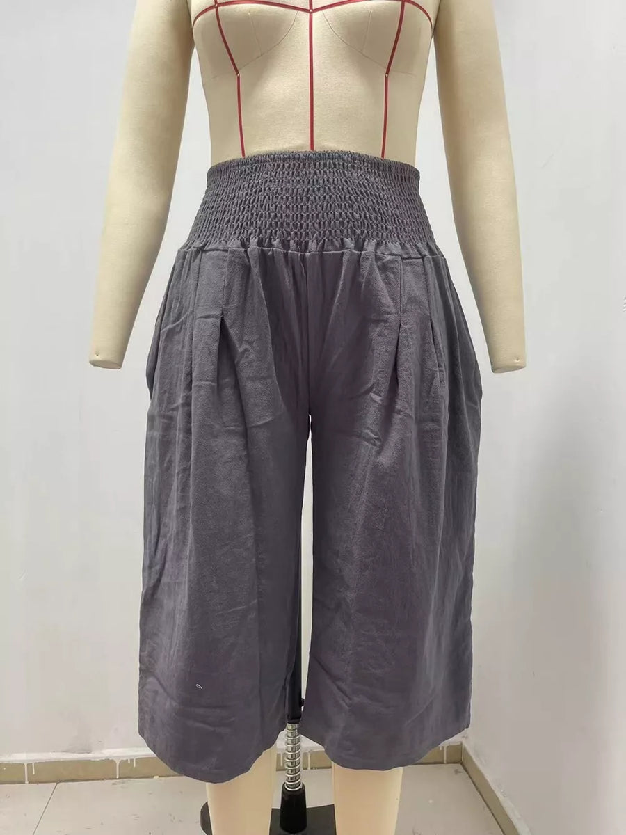 Gray linen blend culottes with smocked high waist and wide legs