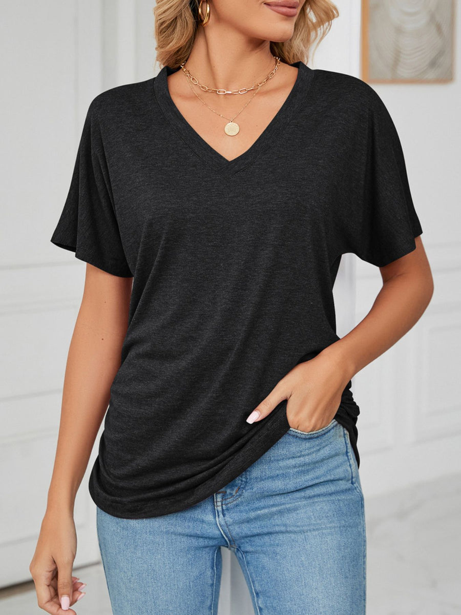 Relaxed V-neck short sleeve t-shirt in dark grey with a draping fit.