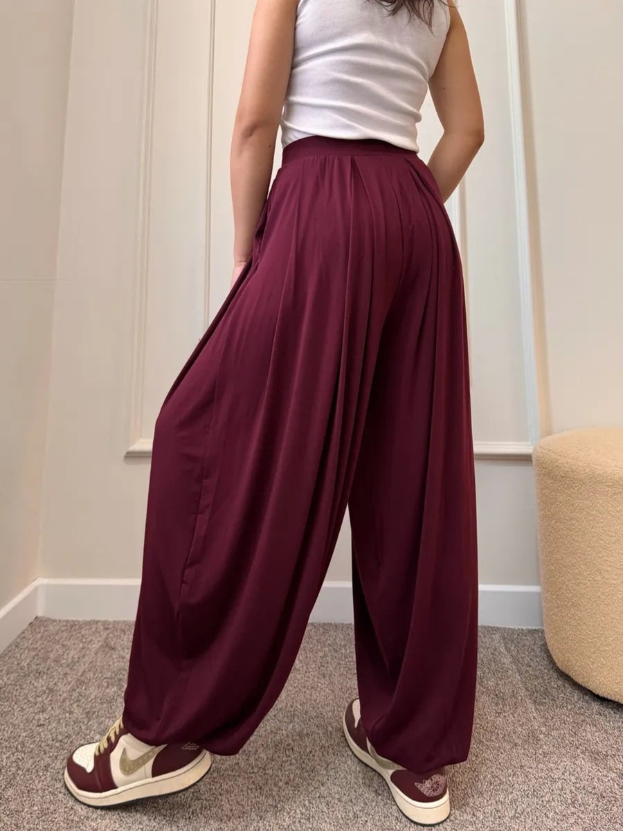100% polyester Care instructions: Machine wash cold wide-leg pants in Blue with loose silhouette