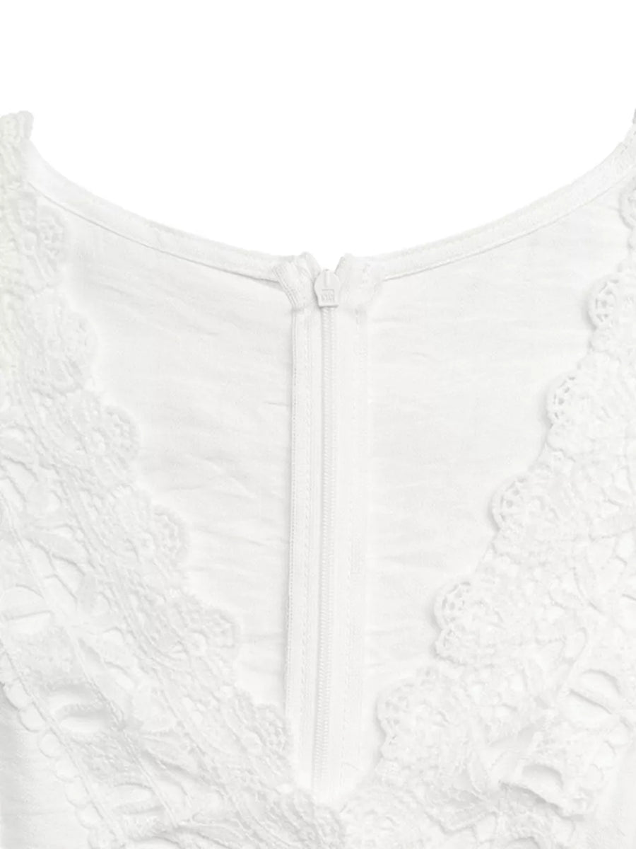White lace-trimmed wide-leg romper with a zipper closure