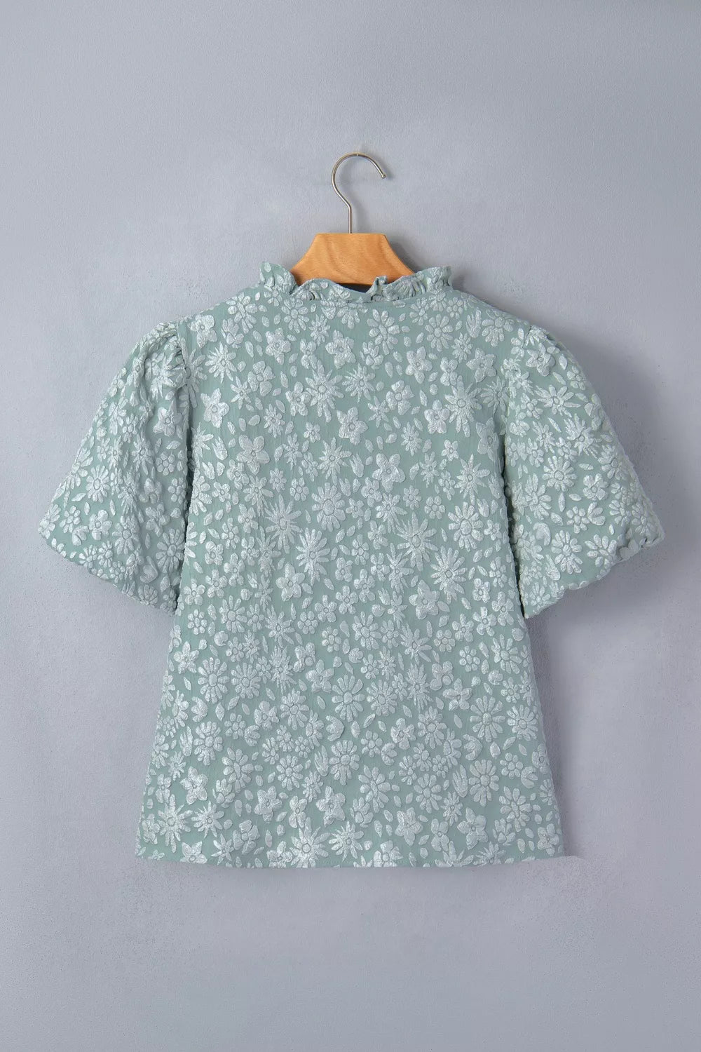 Embroidered floral puff sleeve shirt with ruffled neckline in light green polyester