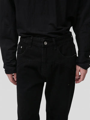 Panelled flare jeans in dark wash denim with pocket detail and button fly.