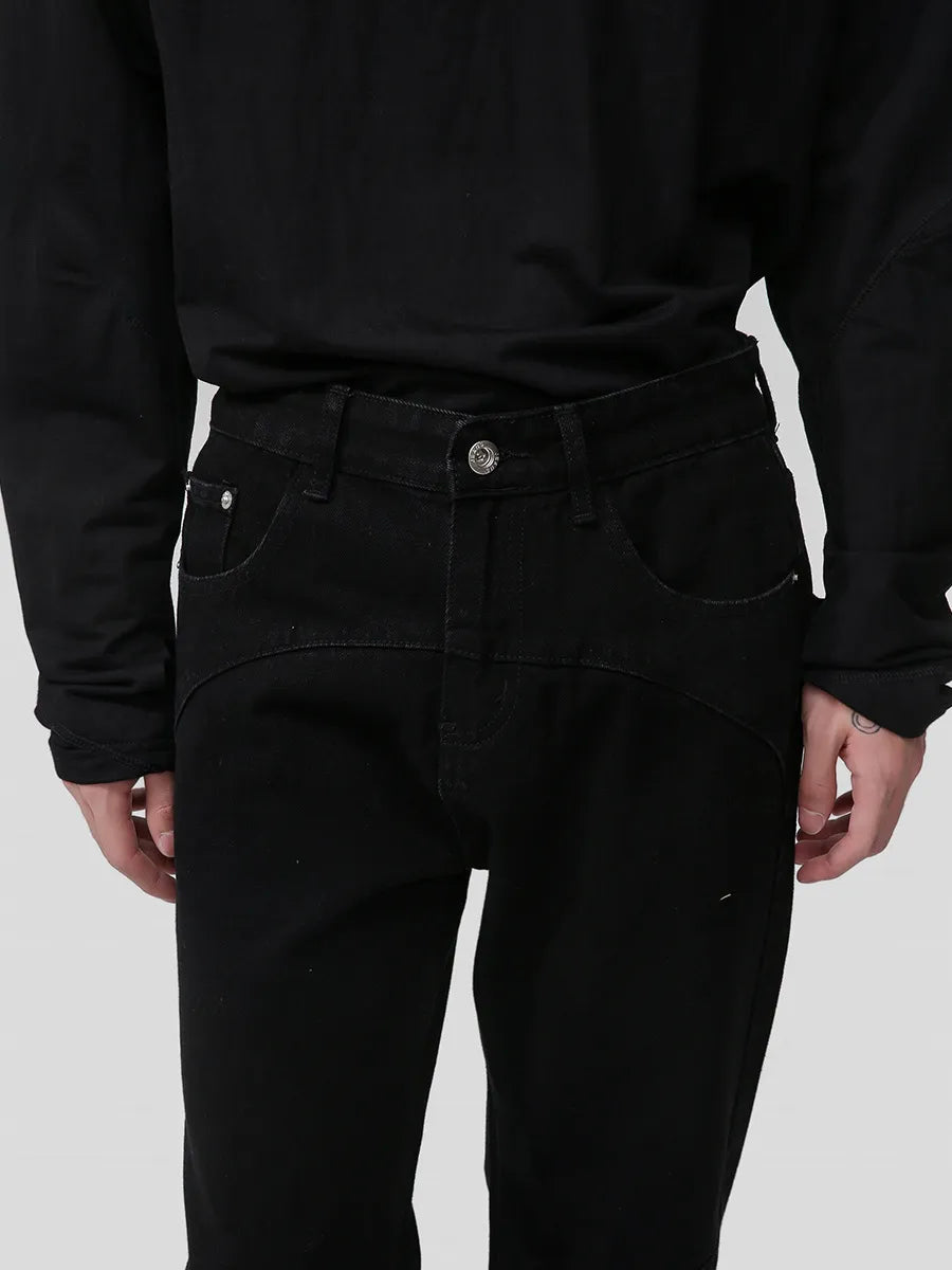 Panelled flare jeans in dark wash denim with pocket detail and button fly.