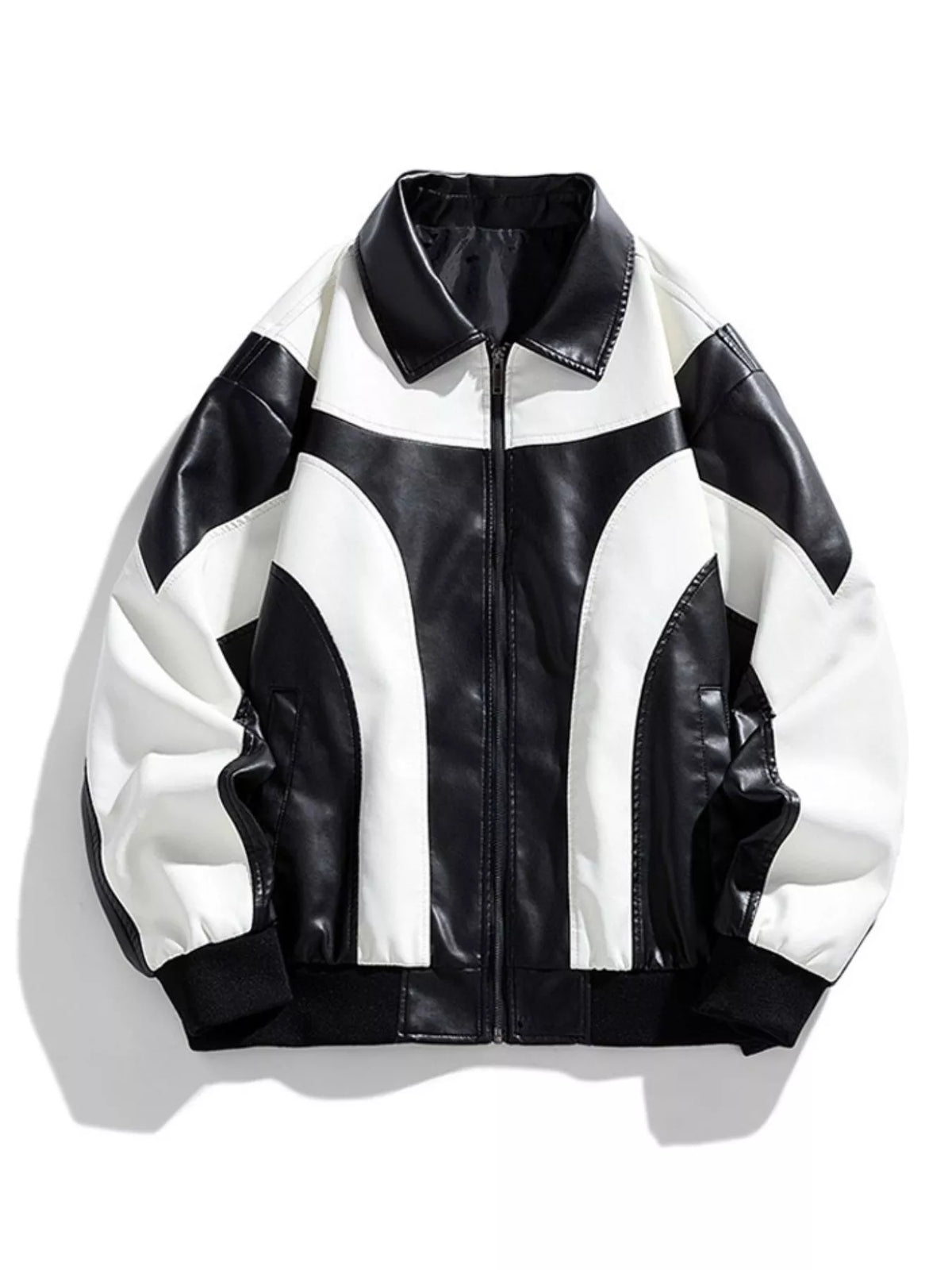 Retro faux leather bomber jacket in black and white with a colorblock design and ribbed cuffs.