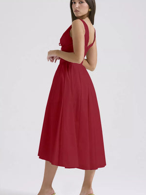 Deep Red V-neck midi dress with a-line skirt and tie detail.