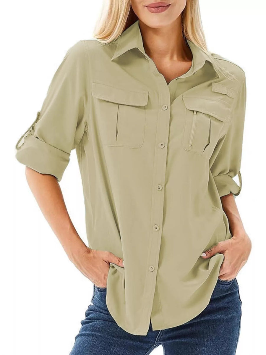 Sage roll-up sleeve button-up shirt with two chest pockets and a zippered pocket.