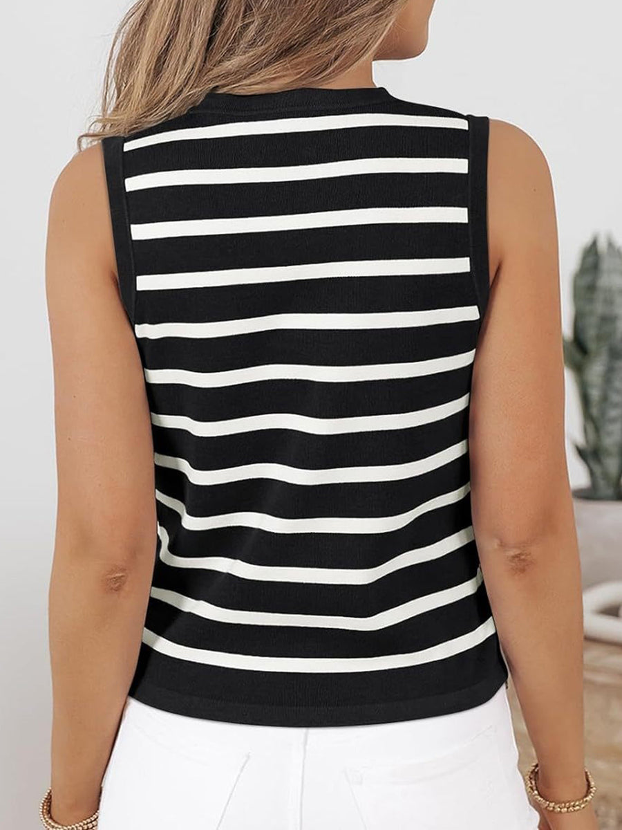 Black and white striped knit top with a mock neck and sleeveless design.