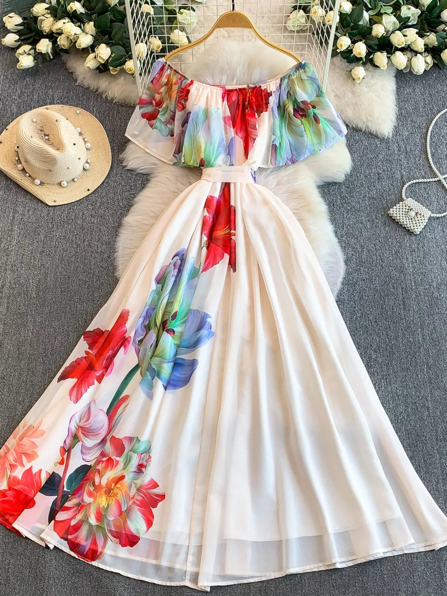 Botanical off-shoulder A-line dress in light pink with floral print and belted waist.