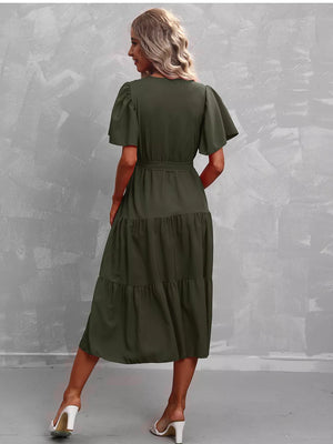 Dark green tiered midi dress with flutter sleeves and belt