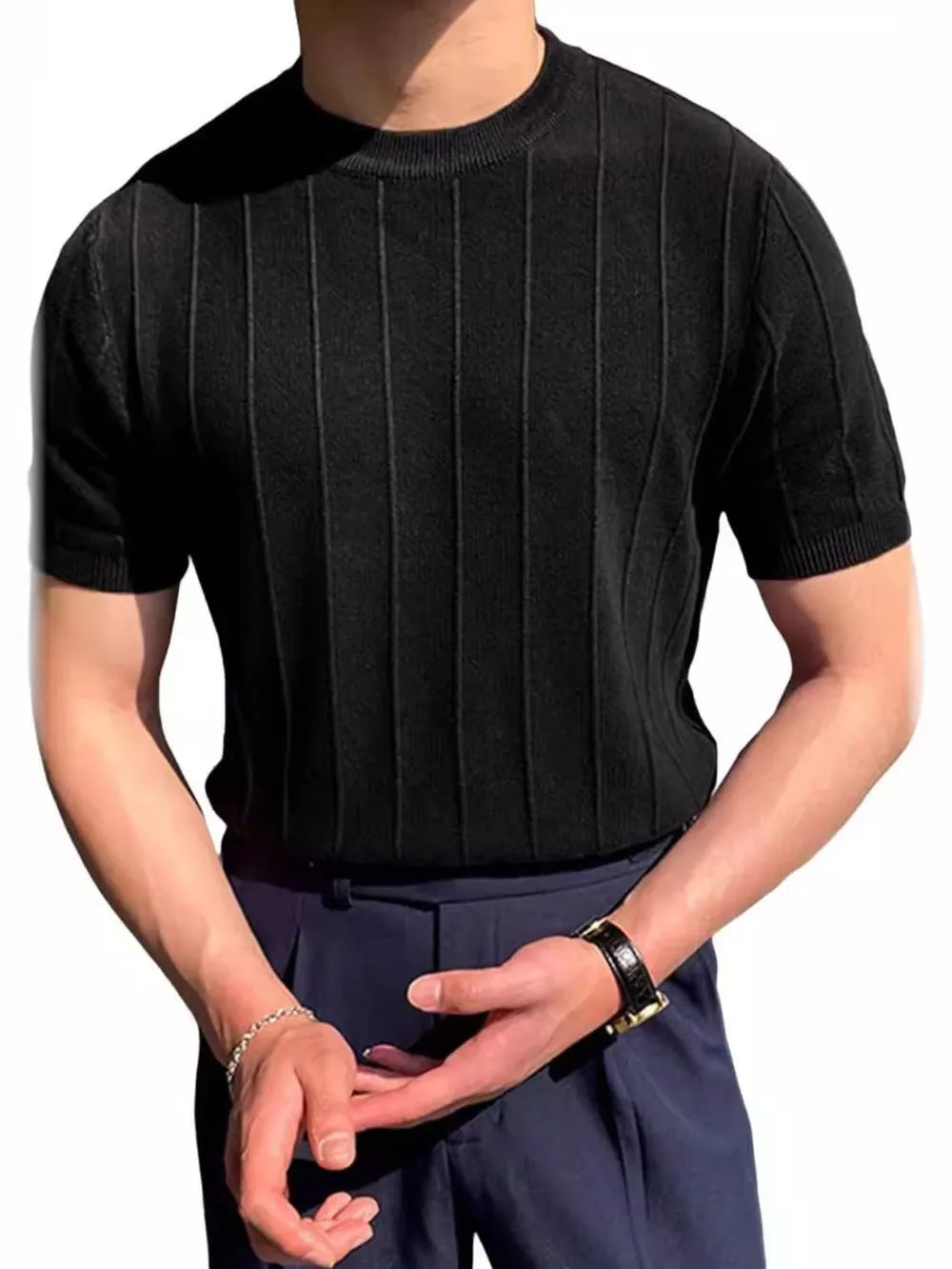 Black ribbed knit crewneck tee with short sleeves and vertical texture.
