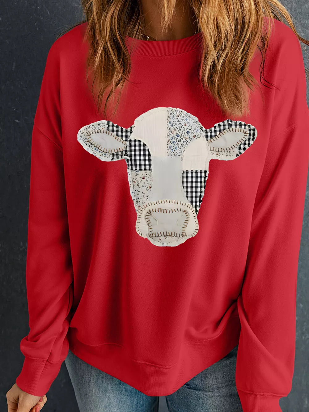 50% polyester, 50% cotton Care instructions: Machine wash cold sweatshirt in black with relaxed silhouette