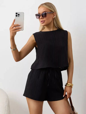 Black textured cotton tank and shorts set with drawstring waist.