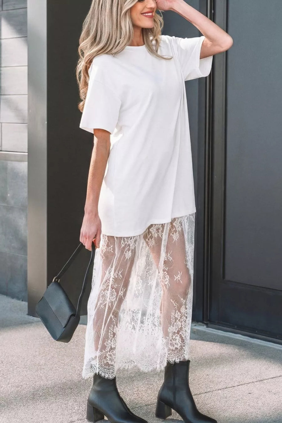White cotton t-shirt midi dress with sheer lace overlay skirt and short sleeves.