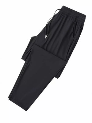 Black sweatpants with drawstring waist and elastic waistband.