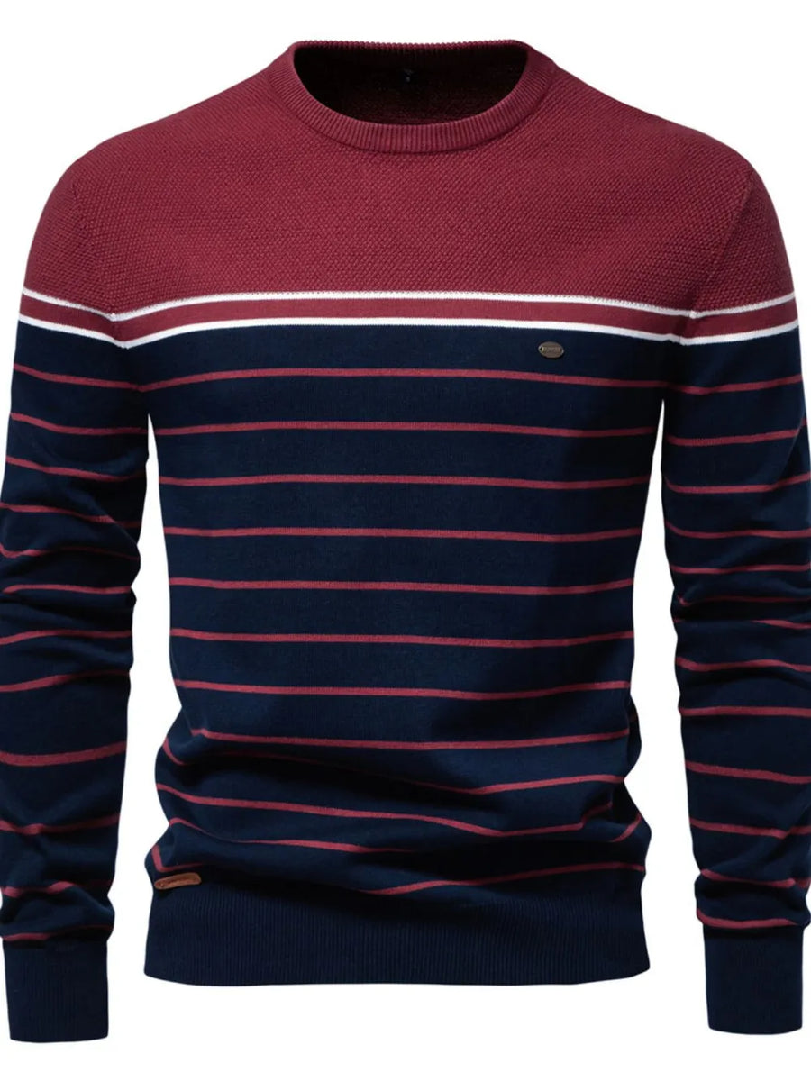 Burgundy and navy striped crewneck sweater with textured yoke and white stripe detail.