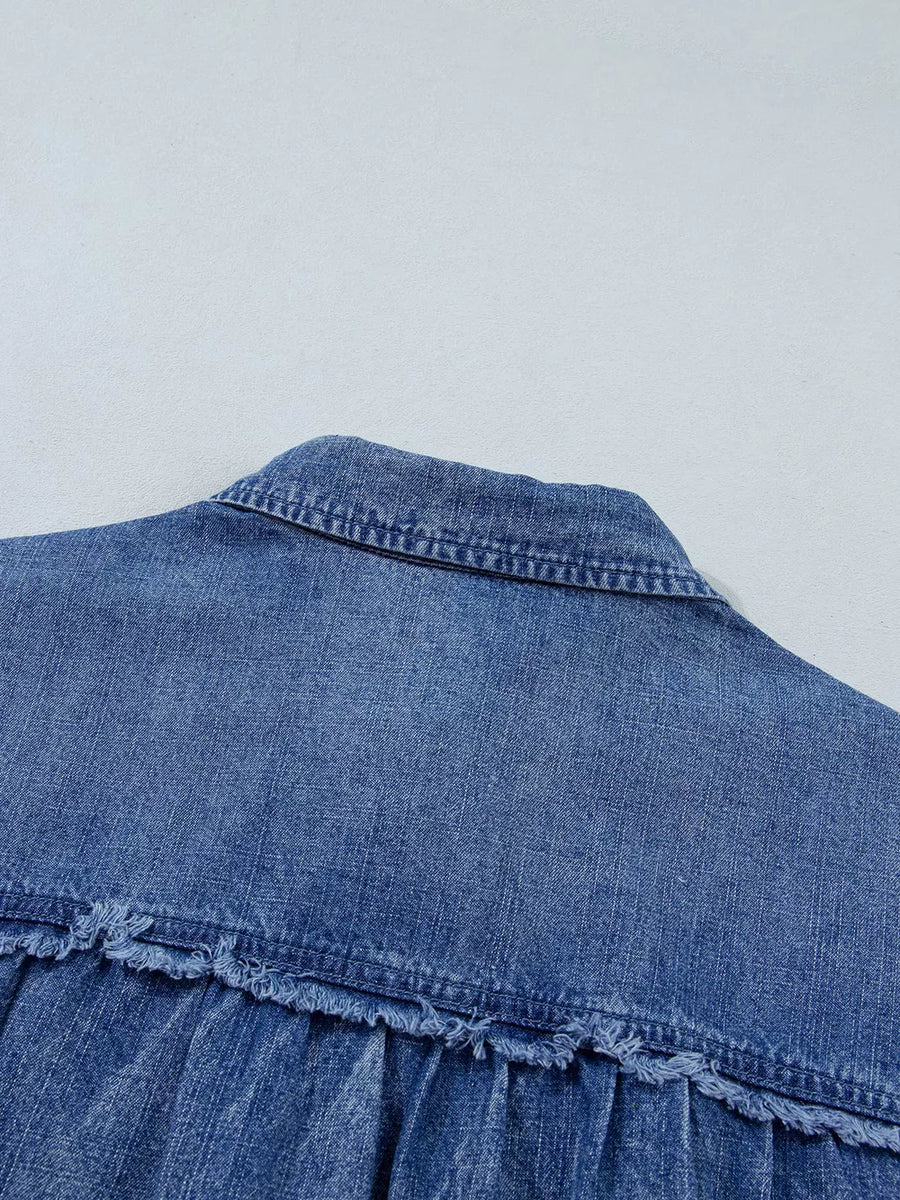 denim blue button-up shirt with button cuffs and 3/4 sleeve