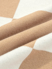 Drop shoulder sweater in camel and white argyle knit fabric.