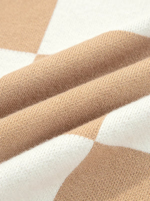 Drop shoulder sweater in camel and white argyle knit fabric.