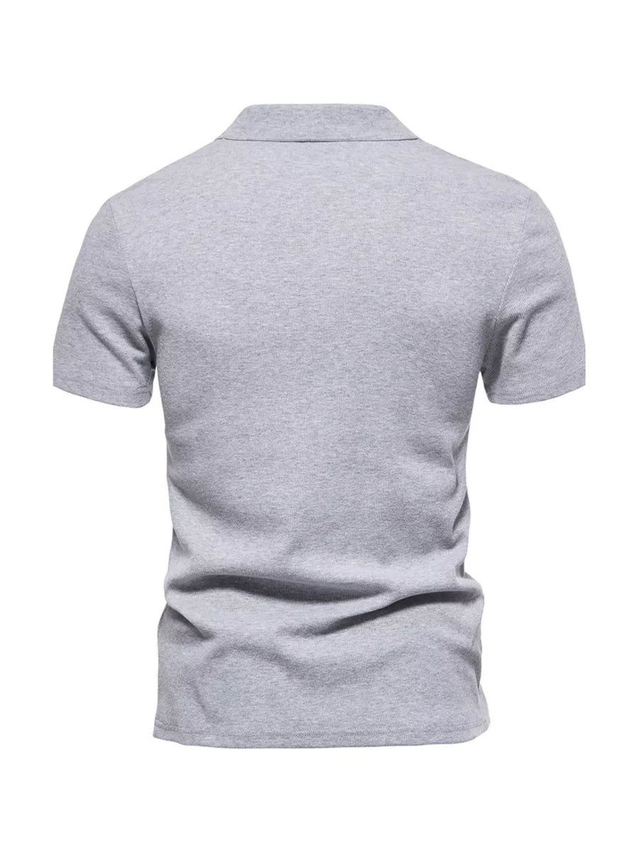 Men's light gray cotton blend casual polo shirt with notched collar and short sleeves.