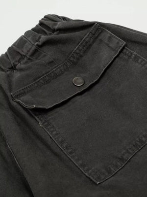 Black cargo pants with elastic waistband and button-flap pocket detail.