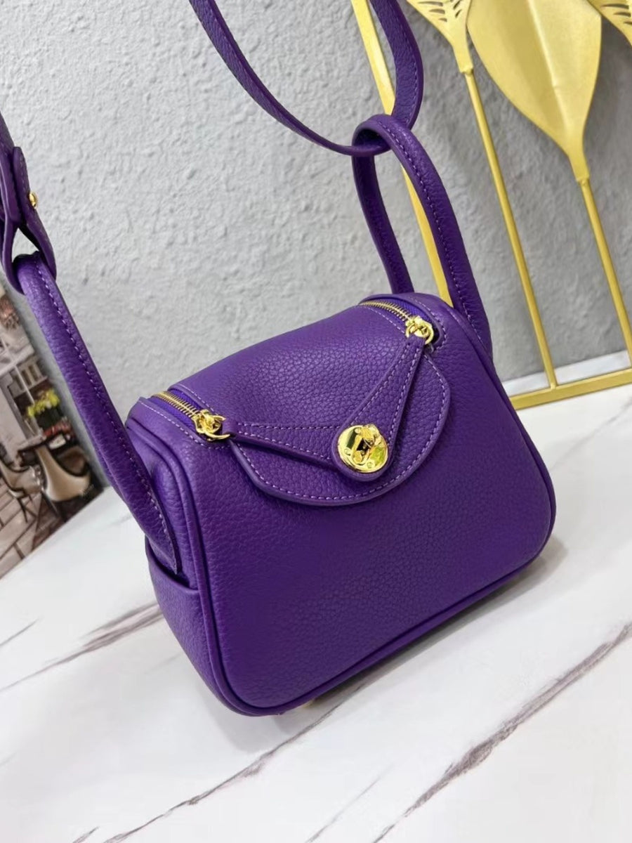 teal with crossbody bag with gold-tone hardware