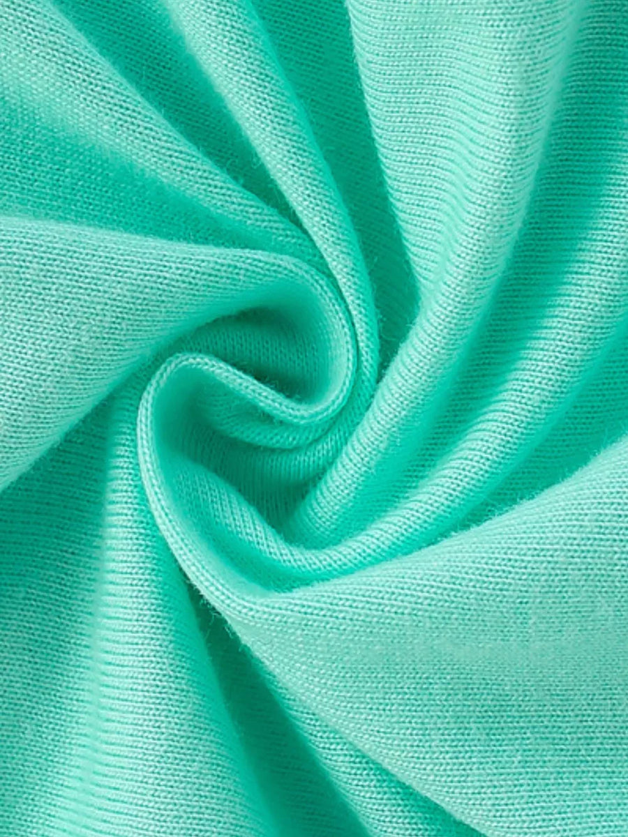 Mint green knit fabric with a subtle ribbed texture, swirled and folded.
