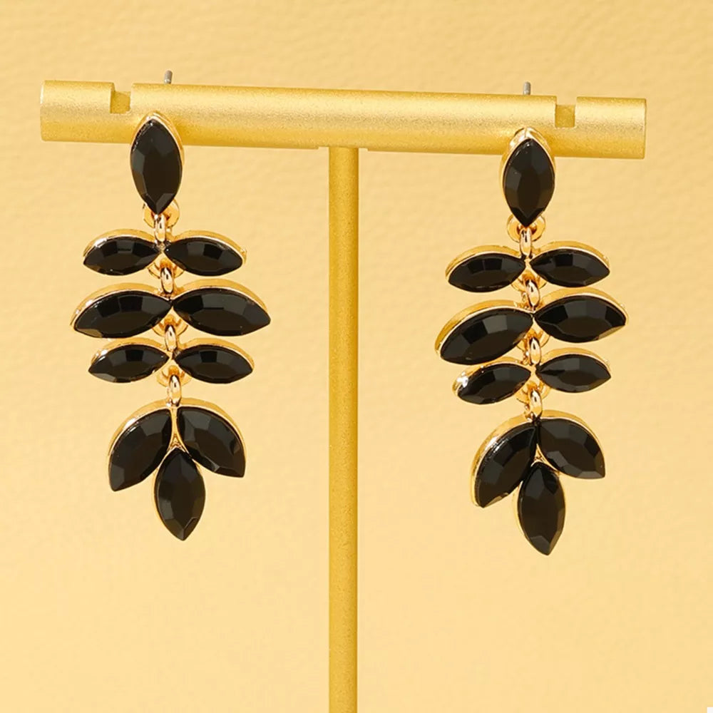 earrings in black featuring drop design and elongated fit