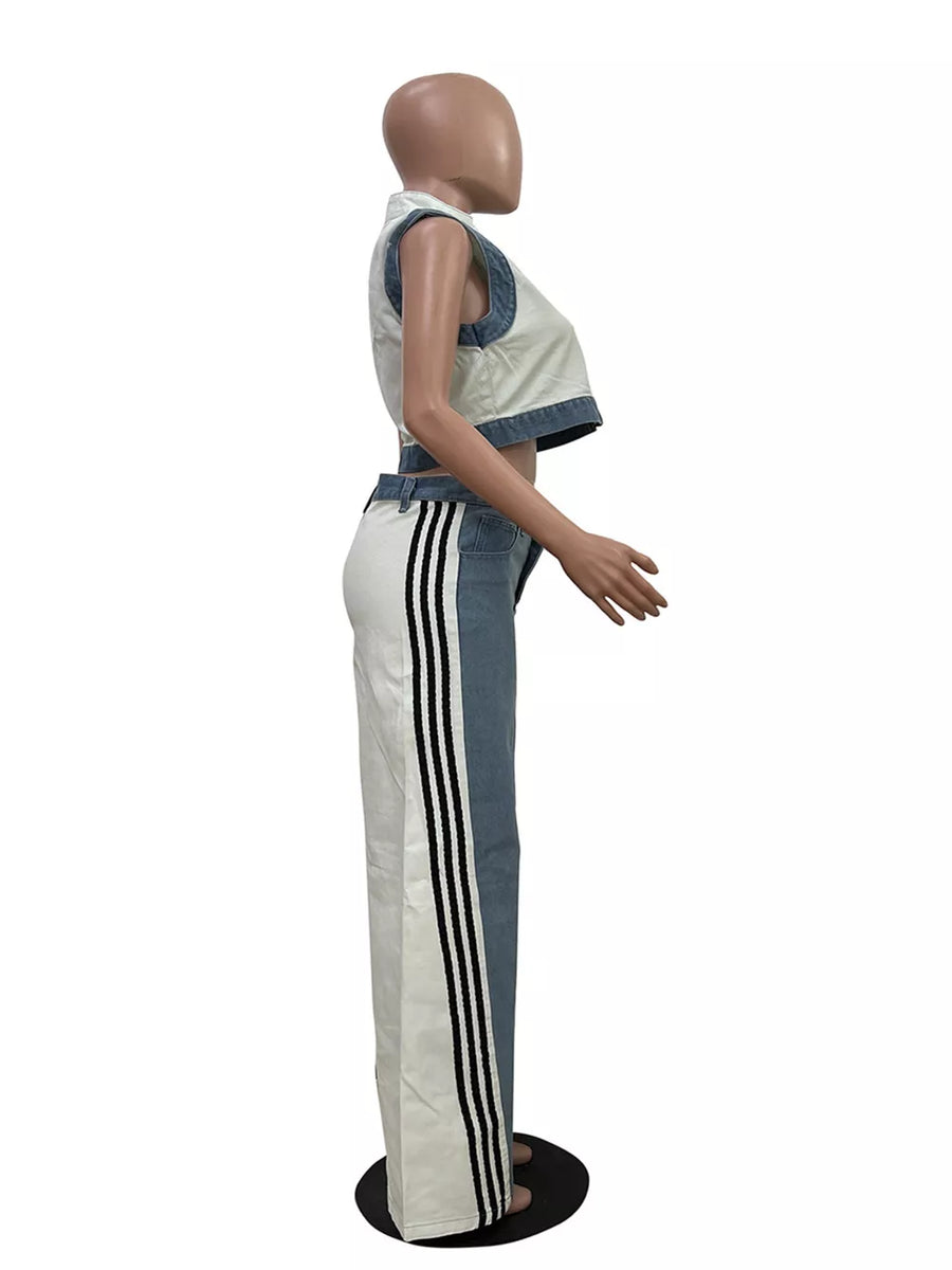 Chic zip-front crop top and wide-leg pants set with side stripe detail.