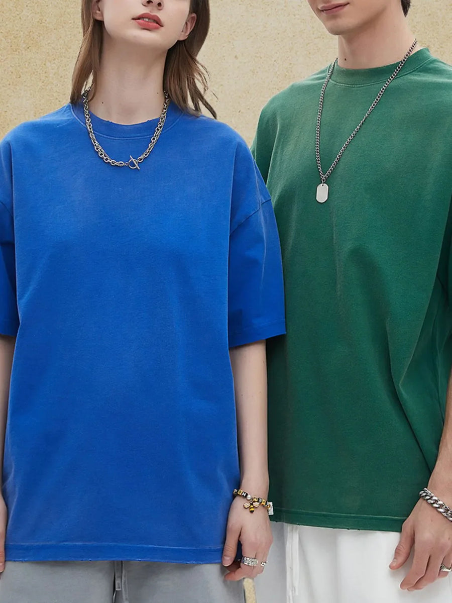 Oversized washed cotton crewneck tee in royal blue and forest green.