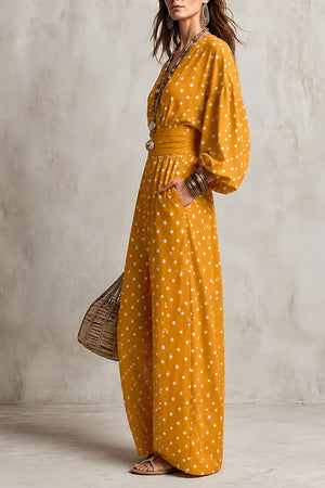 white jumpsuit featuring pocketed and polka dot