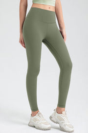 Matcha green high-waist performance leggings with sculpted seams and a smooth finish.