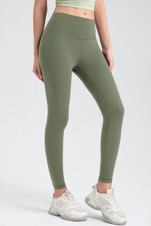 Matcha green high-waist performance leggings with sculpted seams and a smooth finish.
