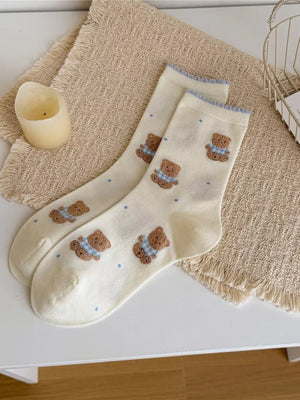 socks in light gray with motif and ruffled cuff