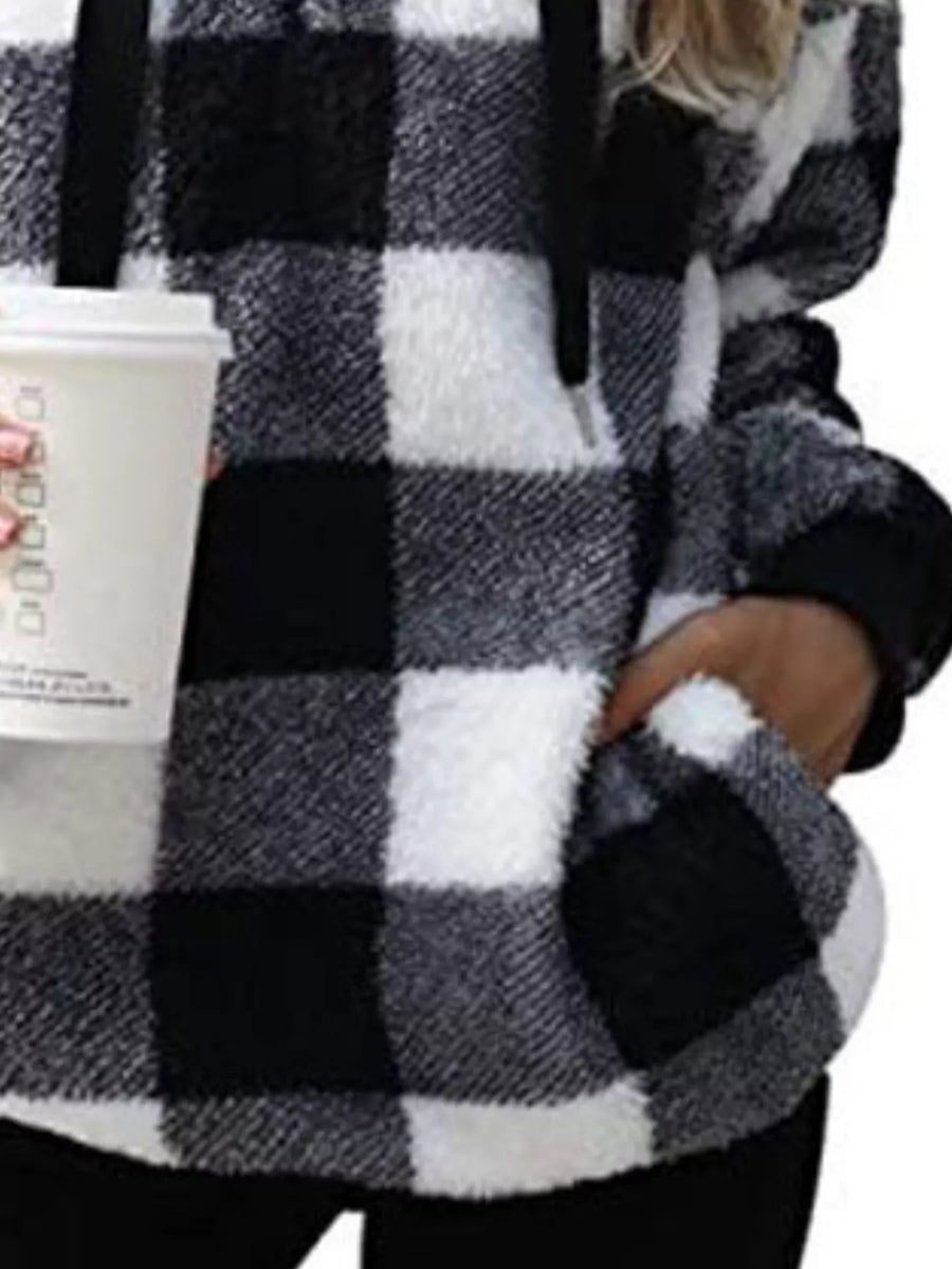 Plaid sherpa drawstring hoodie in black and white with a cozy texture and kangaroo pocket.