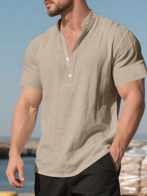 Men's relaxed fit khaki linen blend short sleeve band collar shirt with button-down placket.
