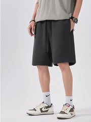 Dark gray chino shorts with drawstring and relaxed fit, men's casual shorts.