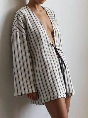 70% polyester, 30% cotton Care instructions: Machine wash cold lounge set in Black with relaxed silhouette