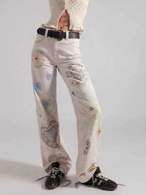 wide-leg jeans in cream featuring high-waisted and flared fit