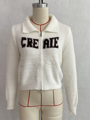 cardigan in Brown with letter graphic and zipper
