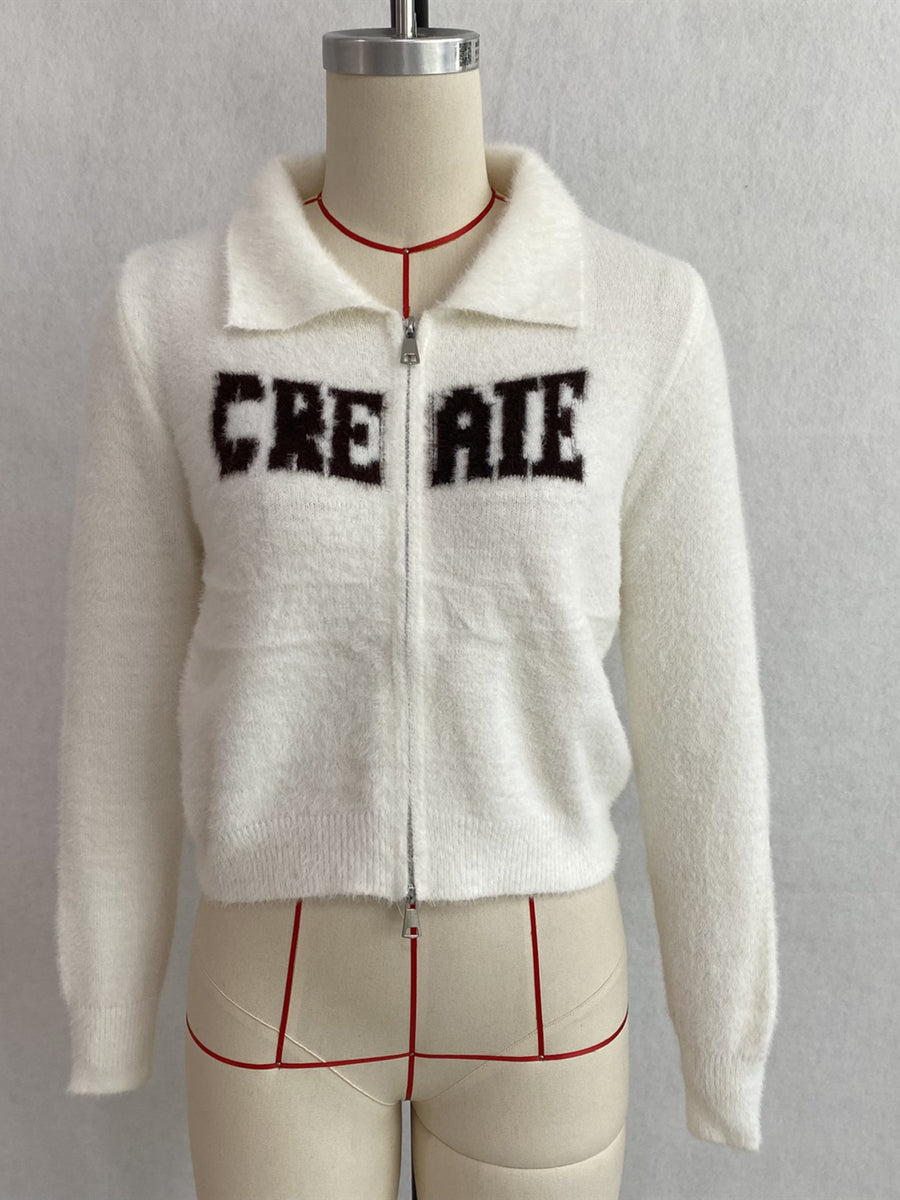 cardigan in Brown with letter graphic and zipper